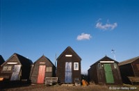 Huts and two clouds